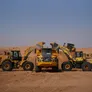 Komatsu WA470 &amp; CAT 966L rented loaders working alongside a Volvo A40G dump truck from Al MArwan's rental fleet