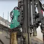 The MRZVV vibrating head mounted on an ABI Mobilram TM17 sheet piling rig