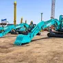 Multiple Kobelco SK220 medium 22 ton excavators at Al Marwan’s yard ready for deployment