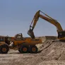 Rental fleet machinery, Komatsu PC400 excavator and A45G sump truck