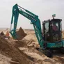 SK35 mini excavator on job site