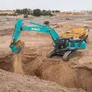 SK500 excavator in action