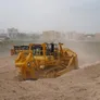The large Komatsu D475A-5E0 bulldozer on Aljada by Arada community development project