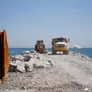 Al Marwan's machinery at work on a marine barriers development project in Oman