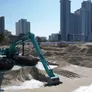 Amphibious SK380 excavator in action.