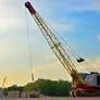 Crawler crane with a wrecking ball