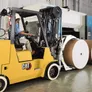 A CAT forklift attached to clamps