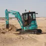 KOBELCO SK35SR mini excavator in green blue