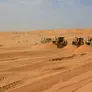 multiple sized komatsu dozers