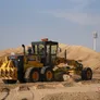 A Komatsu GD775 motor grader