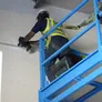 Proper use of a safety harness with a lanyard