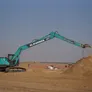 Kobelco SK220 equipped with a long reach boom