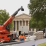 A telescopic crane working in Paris