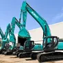 A lineup of KOBELCO medium track excavators in Al Marwan's showroom in JAFZA, Dubai, UAE