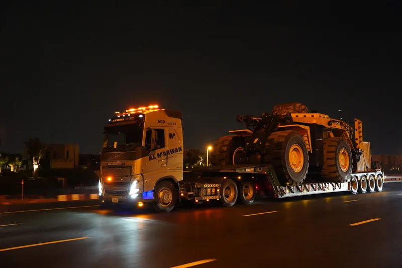 A Komatsu WA900 loader on its way to one of our clients