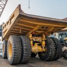 2023 Caterpillar 777 Rigid Dump Truck Rear Left View