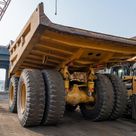 2023 Caterpillar 777 Rigid Dump Truck Rear Left View