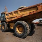 2012 cat 773E rigid dump truck rear left view