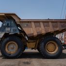 2019 Caterpillar 777E Rigid Dump Truck Left View