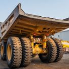 2022 Caterpillar 777 Rigid Dump Truck Rear Left View