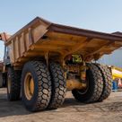 2022 Caterpillar 777E Rigid Dump Truck Rear Left View