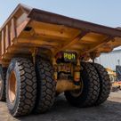 2022 Caterpillar 777E Rigid Dump Truck Rear Left View