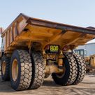2022 Caterpillar 777E Rigid Dump Truck Rear Left View