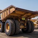 2022 Caterpillar 777E Rigid Dump Truck Rear Left View