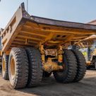 2022 Caterpillar 777E Rigid Dump Truck Rear Left View