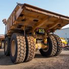 2022 Caterpillar 777E Rigid Dump Truck Rear Left View