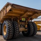 2022 Caterpillar 777E Rigid Dump Truck Rear Left View