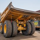 2023 Caterpillar 777 Rigid Dump Truck Rear Left View