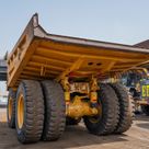 2023 Caterpillar 777 Rigid Dump Truck Rear Left View