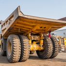 2023 Caterpillar 777 Rigid Dump Truck Rear Left View