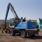 Material Handler 2013 Terex Fuchs MHL 335 rear left view - Al Marwan Heavy Machinery