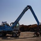 Material Handler 2013 Terex Fuchs MHL 335 right side view - Al Marwan Heavy Machinery